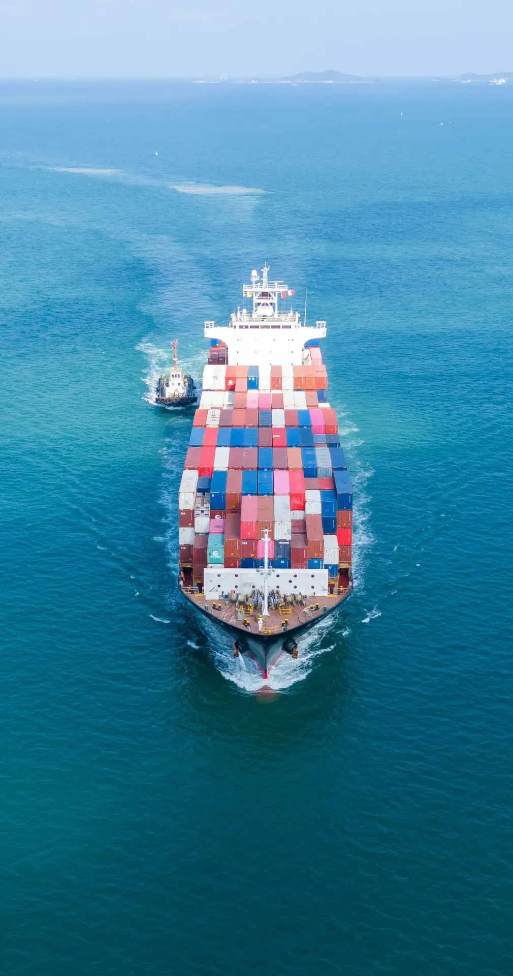 Air freight services UK – cargo ship transporting goods across oceans